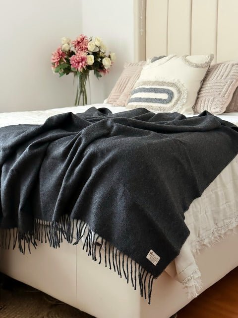 The Throw in Storm, 100% baby alpaca with hand-knotted fringe