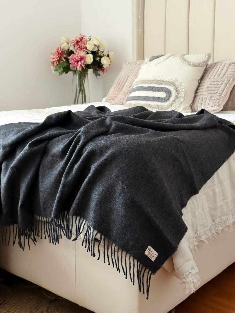 The Throw in Storm, 100% baby alpaca with hand-knotted fringe